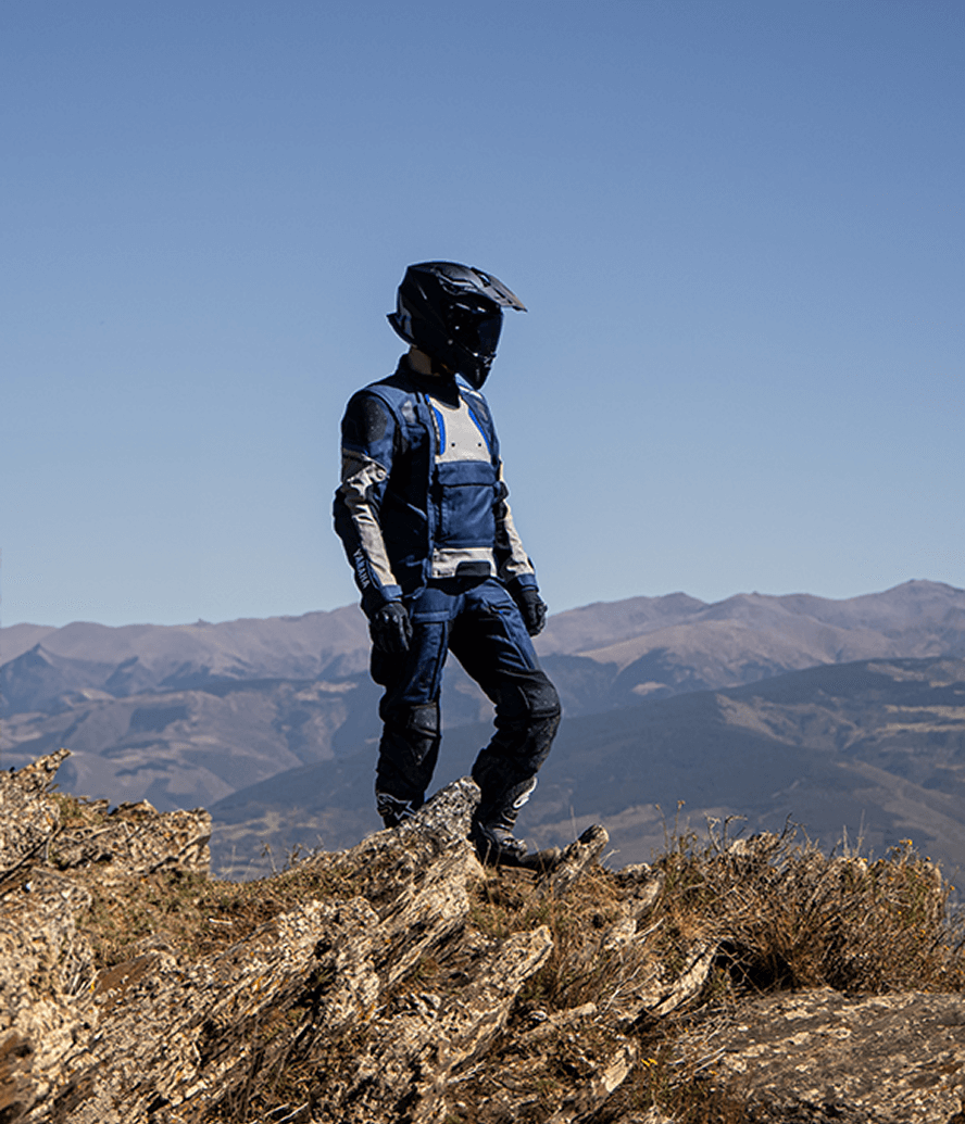 rider standing on the edge of a terrain